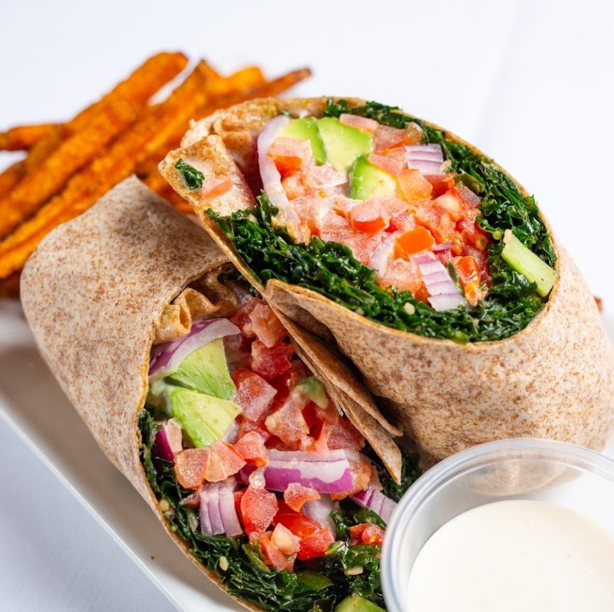 A wrap with sweet potato fries